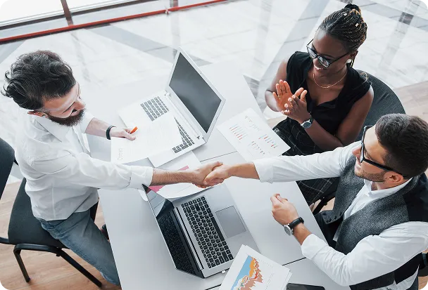 Team analyzing metrics at a work table