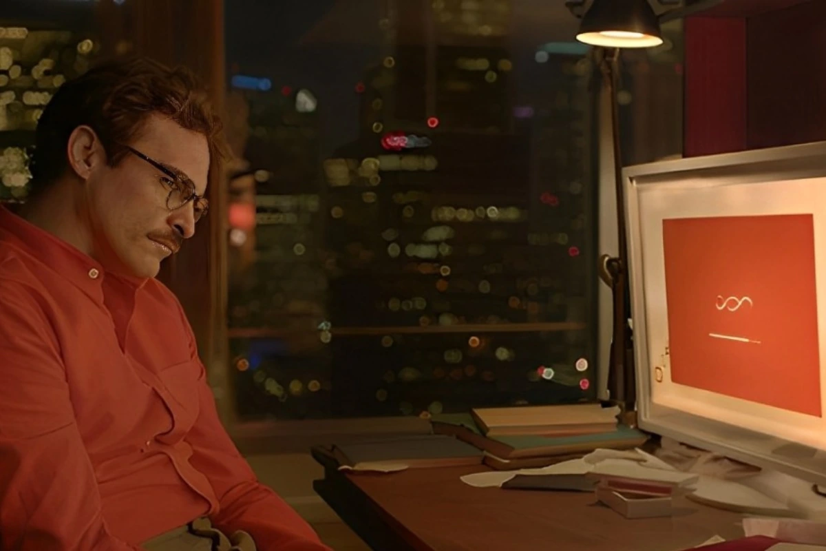 A man sitting in front of a computer