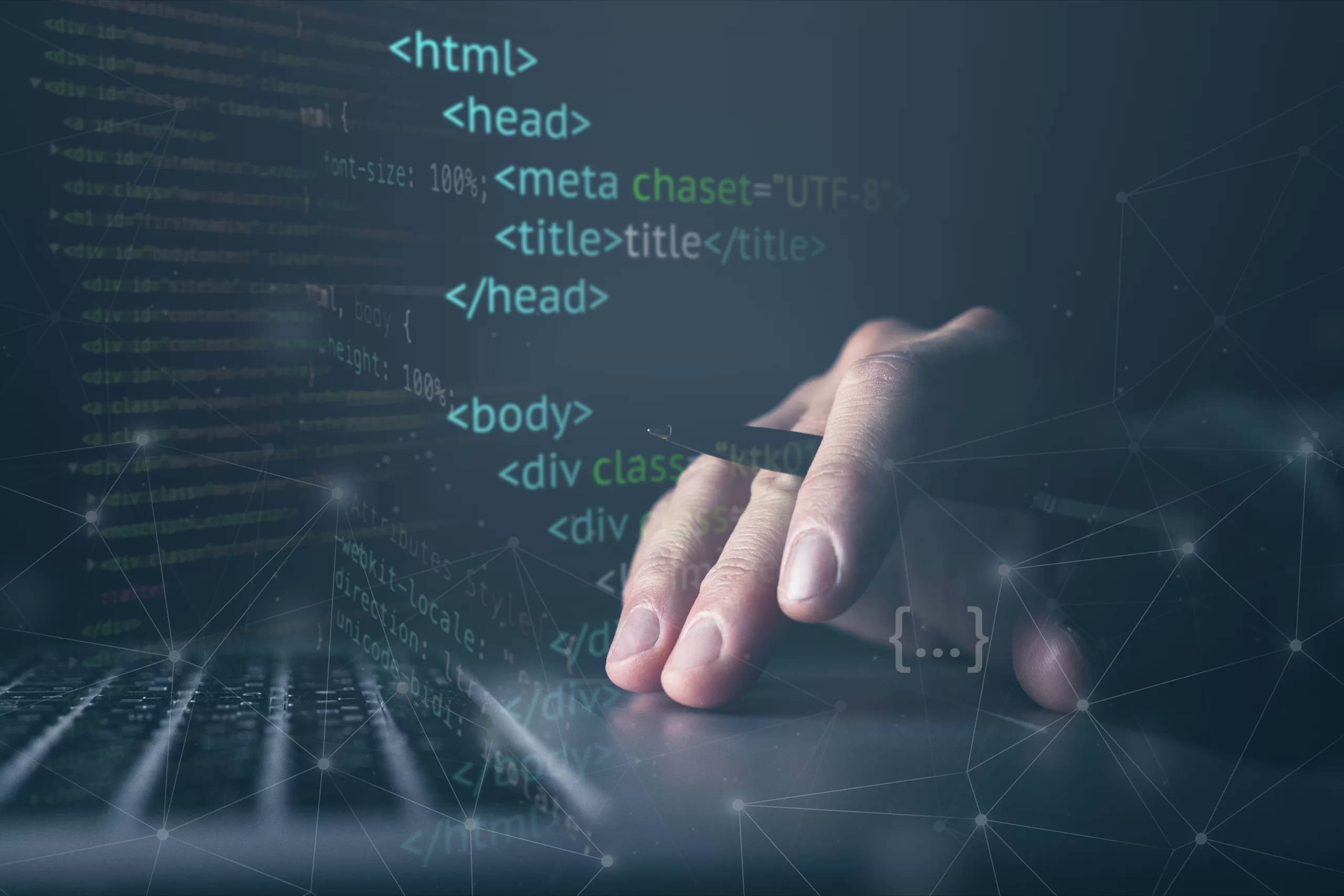 A hand typing in a keyboard holding a pencil 