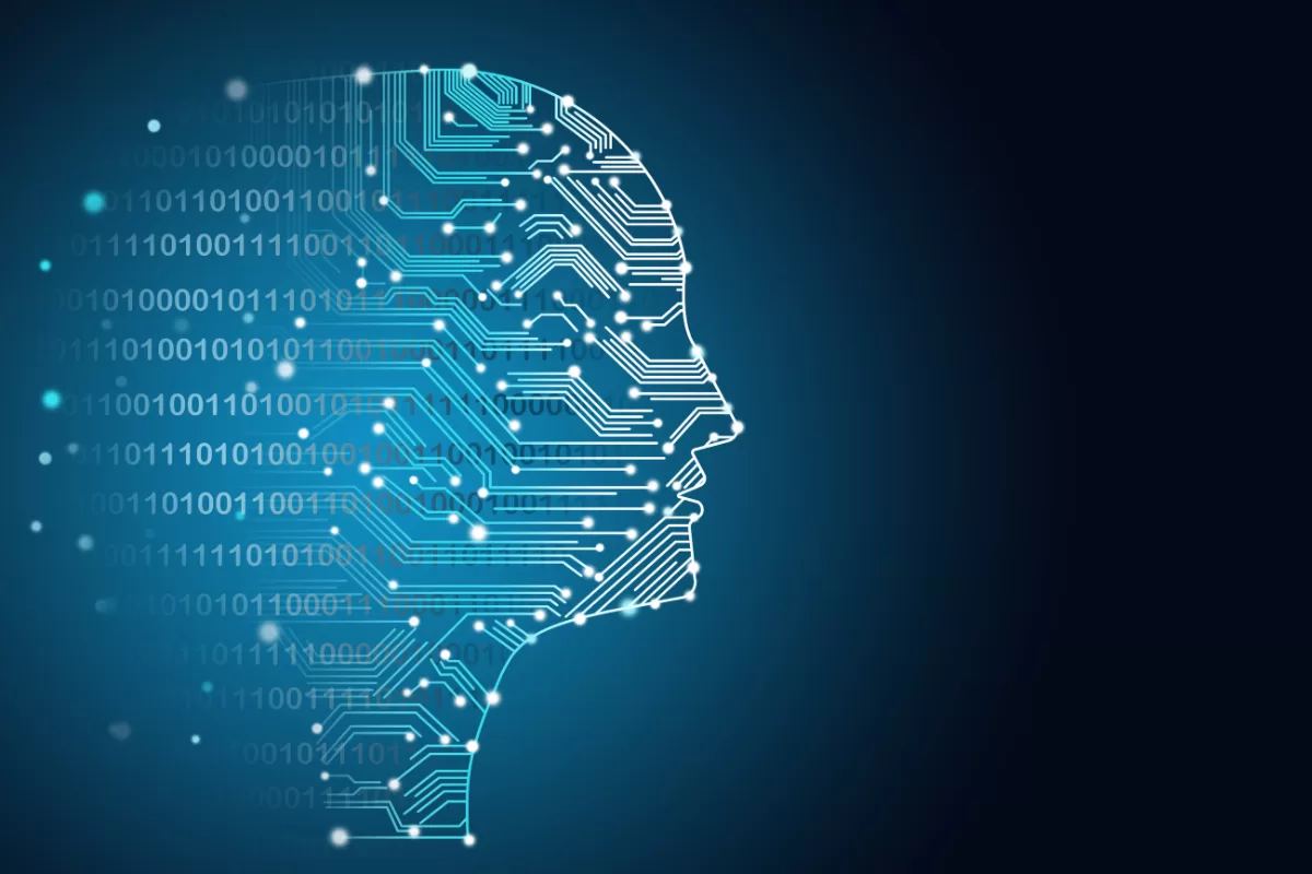 Human face silhouette formed by digital circuits and binary code, illustrating trends in artificial intelligence and machine learning