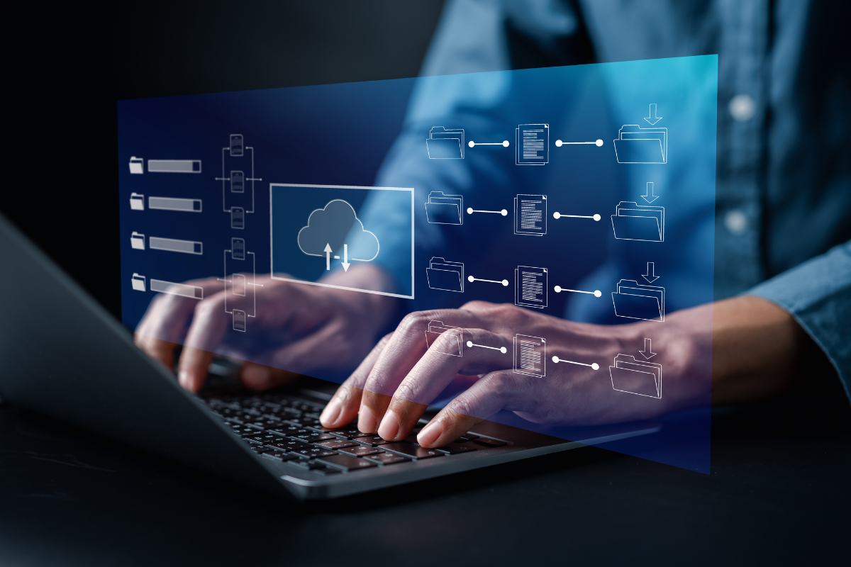 Professional typing on laptop with cloud database diagram overlay, most popular databases in 2026