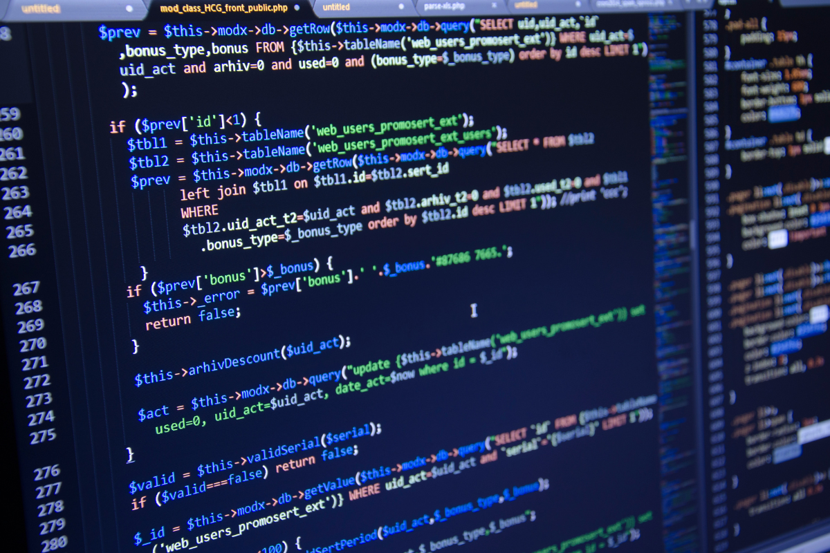 Code editor screen displaying PHP programming lines, representing software development