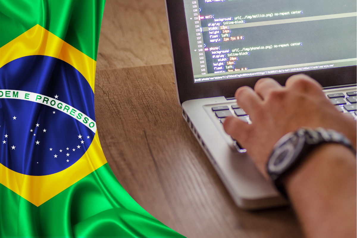 Brazilian software developer typing code on a laptop, with the Brazilian flag in the background, representing Brazil's nearshore technology market