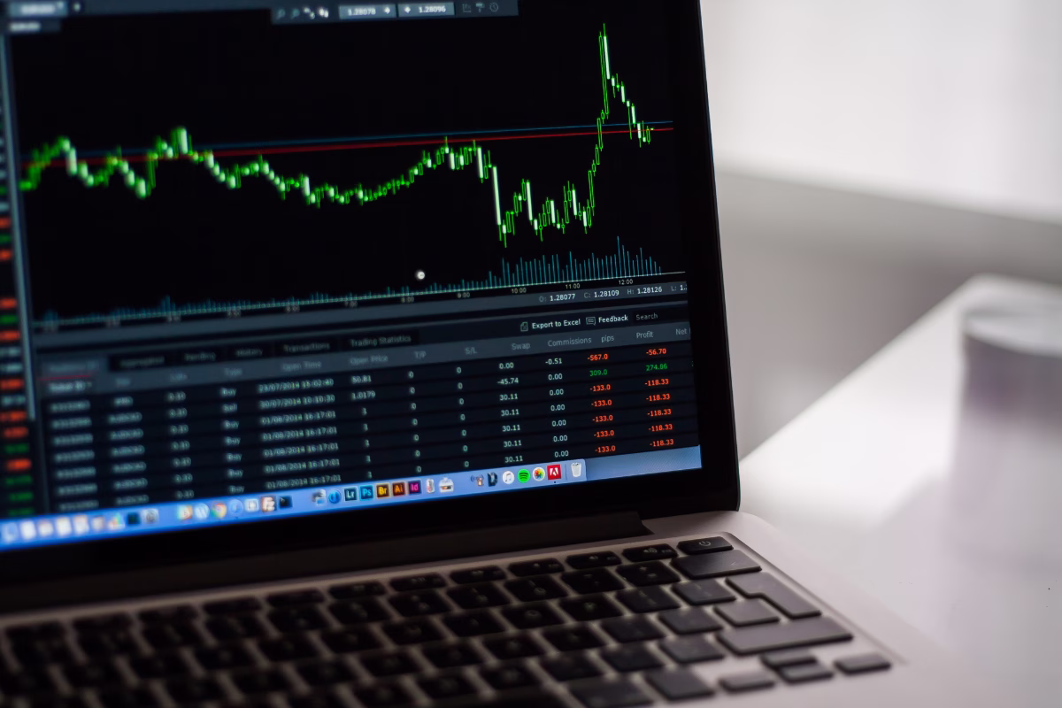 Screen displaying financial trading chart and transaction data — technology for fintechs and financial sector