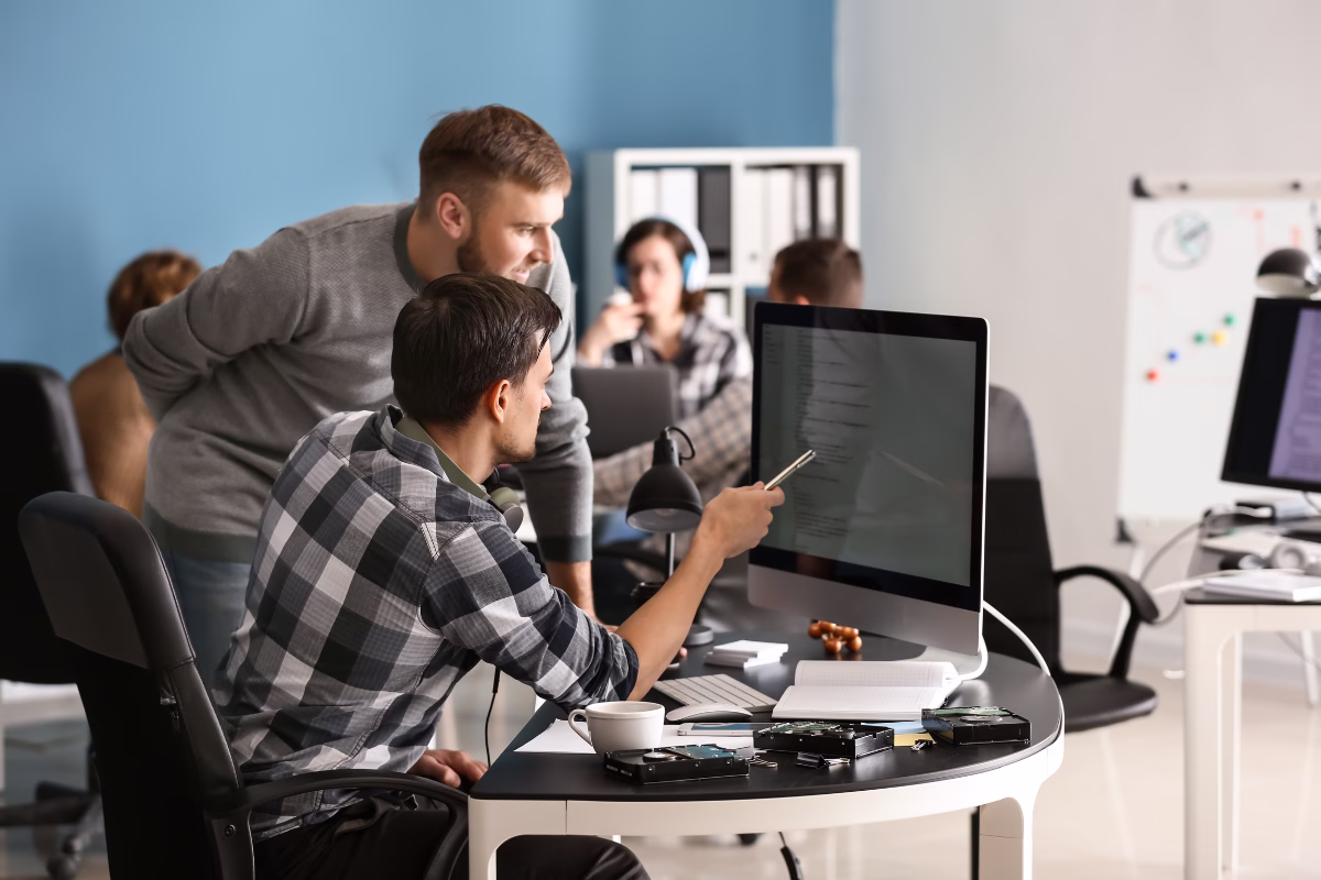 IT professional interacting with a digital interface representing technology outsourcing